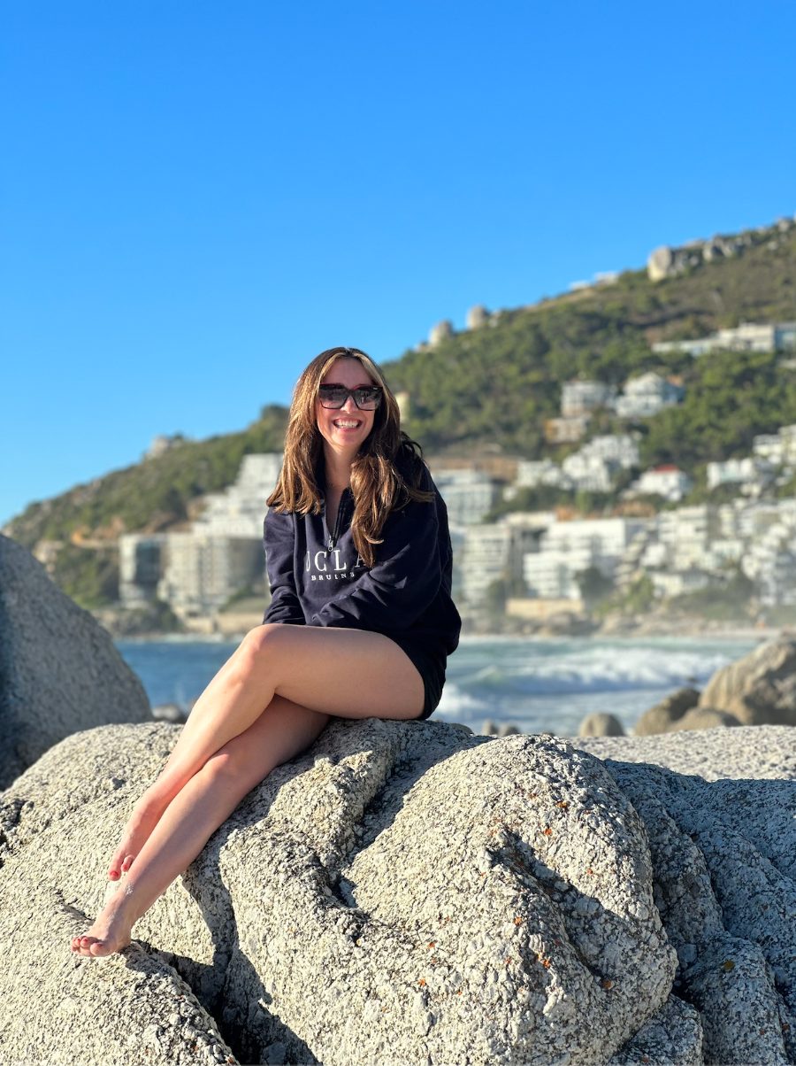 Sitting on rocks above the coast